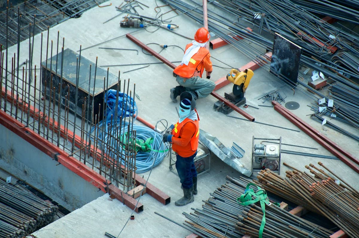 Specialists carrying out industrial construction work